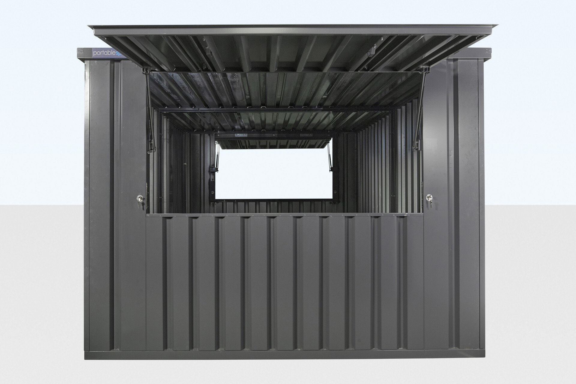 Window detail on slate grey flat pack kiosk